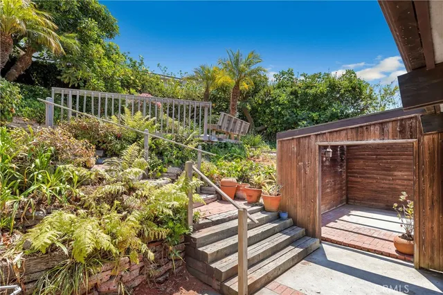a view of a terrace with a garden