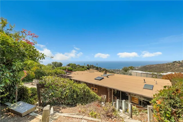 a view of a balcony with chairs