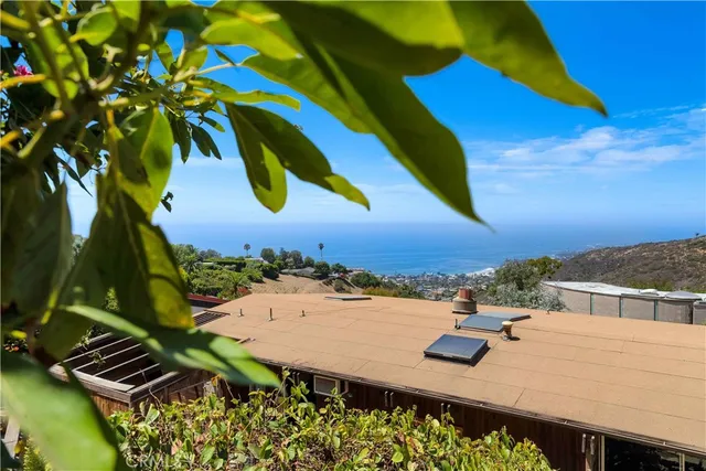 a kitchen with stainless steel appliances white cabinets and a stove