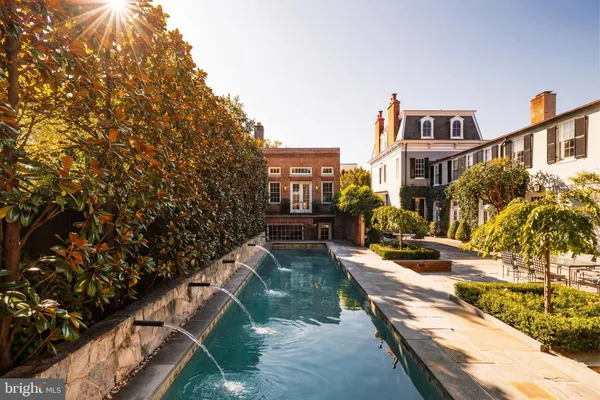 a view of multiple houses with yard