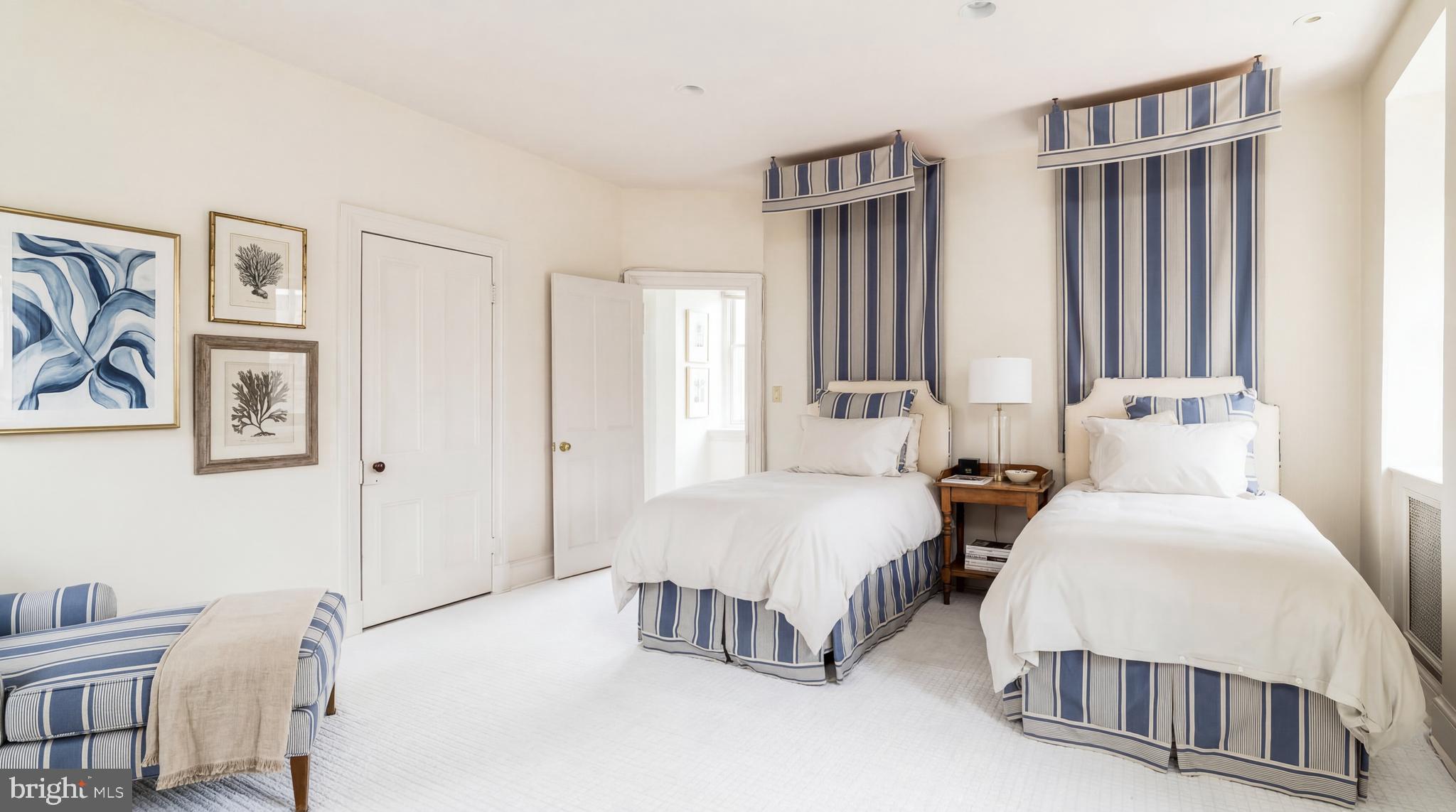 3117 O Street Northwest Washington, DC 20007 - Photo 32 of 50 a spacious bedroom with two beds and a window