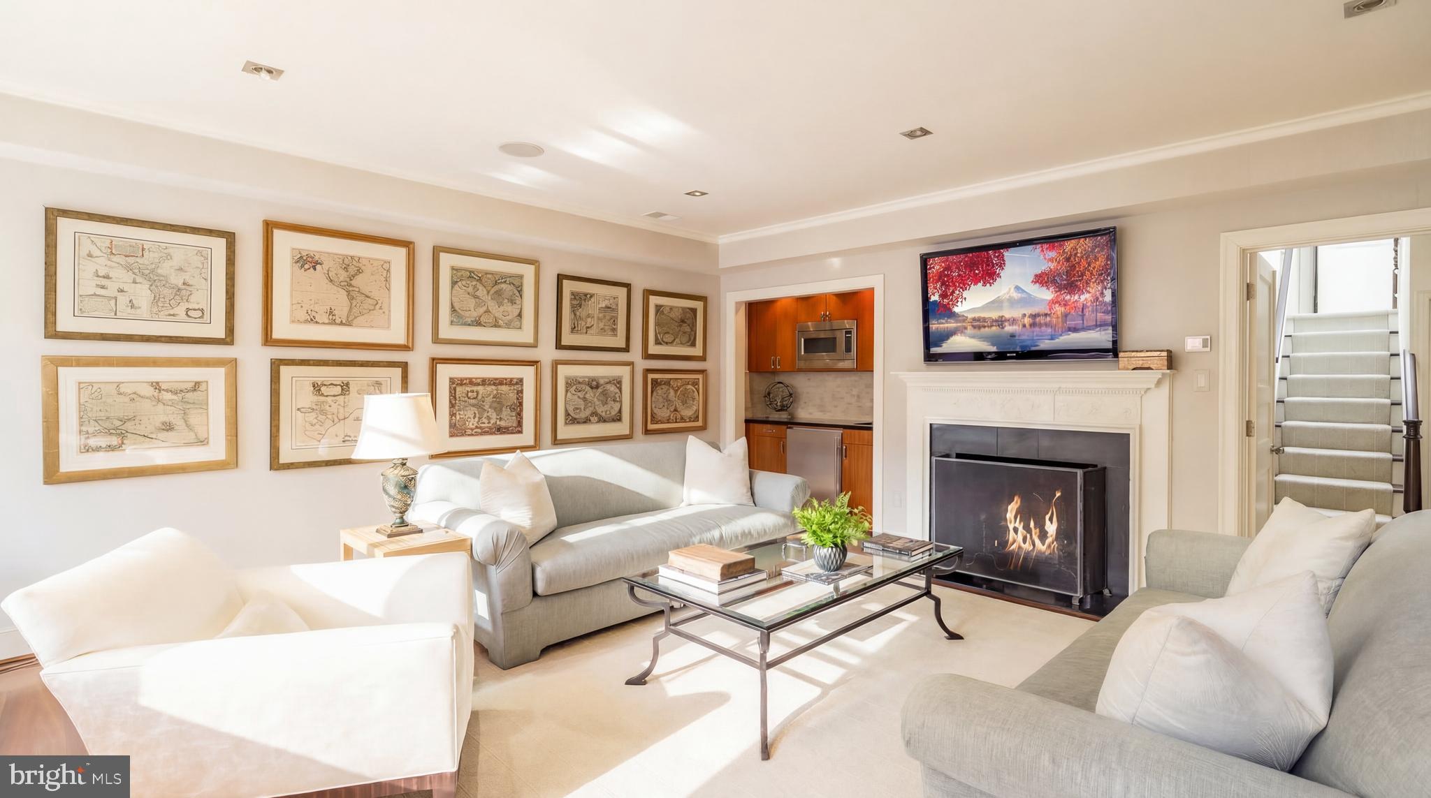 3117 O Street Northwest Washington, DC 20007 - Photo 35 of 50 a living room with furniture a fireplace and a large window