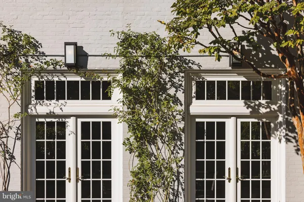 a front view of a house with swimming pool