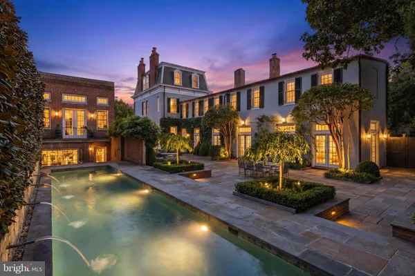 a view of a house with swimming pool