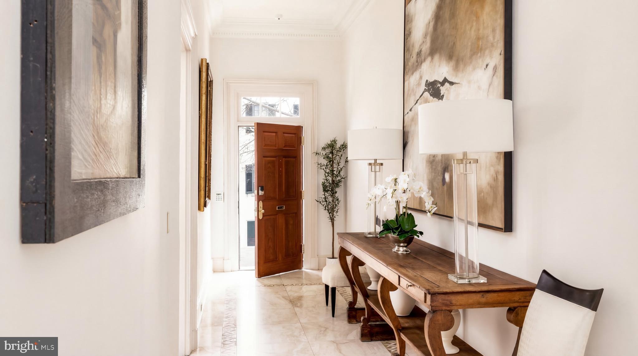 3117 O Street Northwest Washington, DC 20007 - Photo 6 of 50 a view of an entryway with furniture and wooden floor