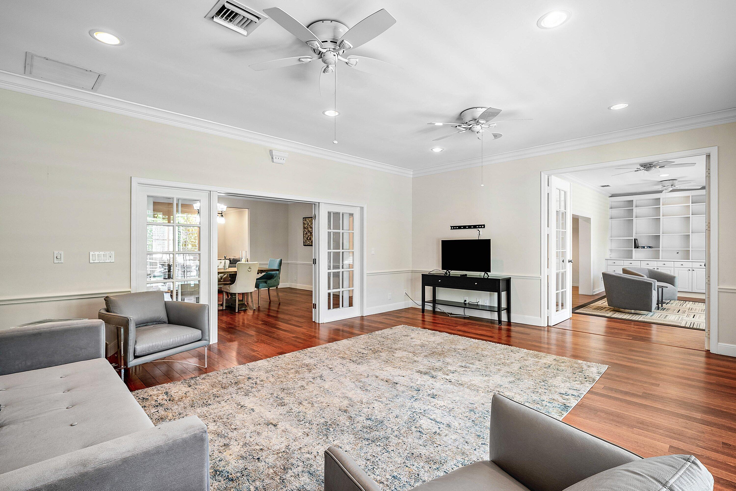 2121 Areca Palm Road Boca Raton, FL 33432 - Photo 16 of 54 a living room with furniture and wooden floor