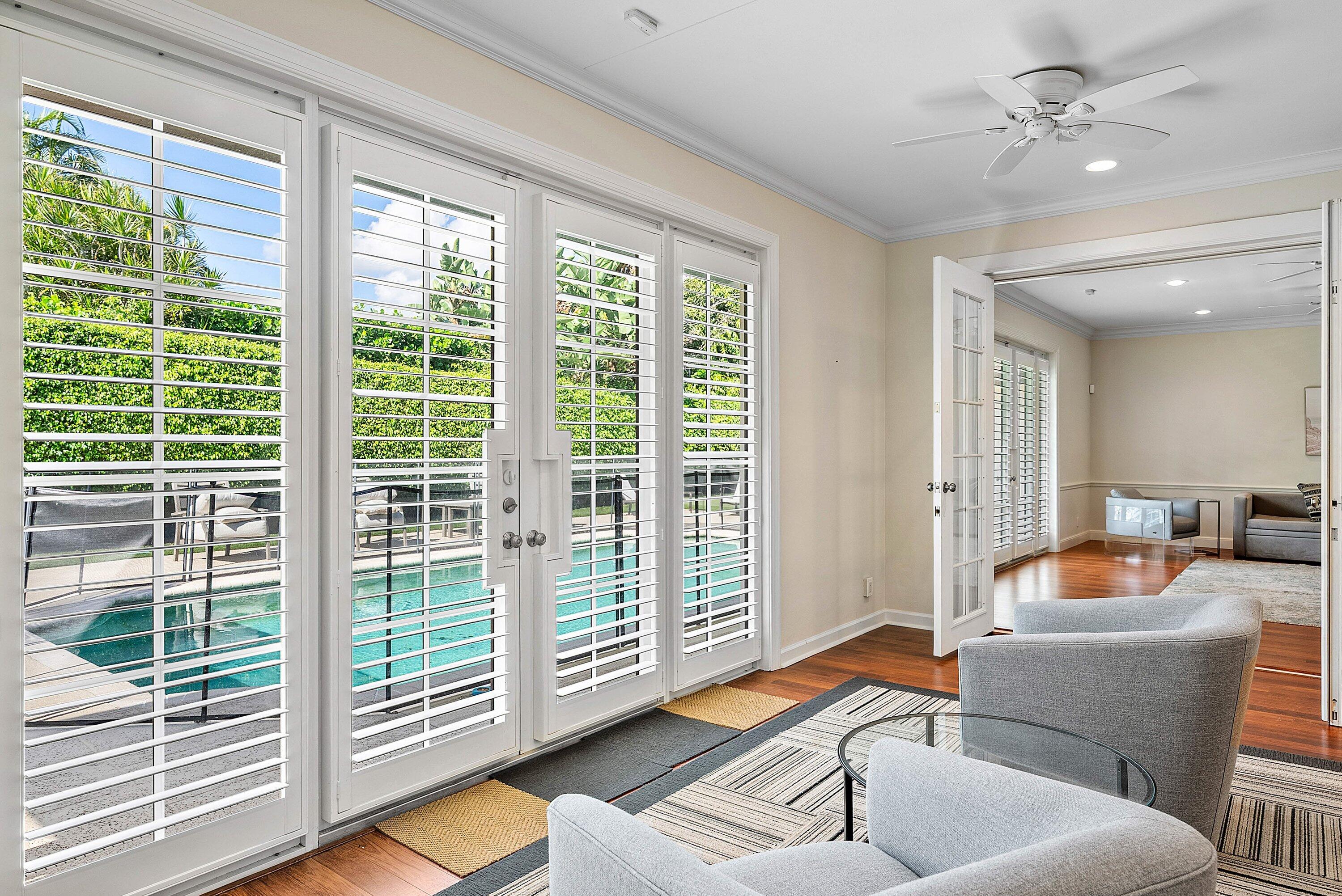2121 Areca Palm Road Boca Raton, FL 33432 - Photo 18 of 54 a living room with furniture and a balcony