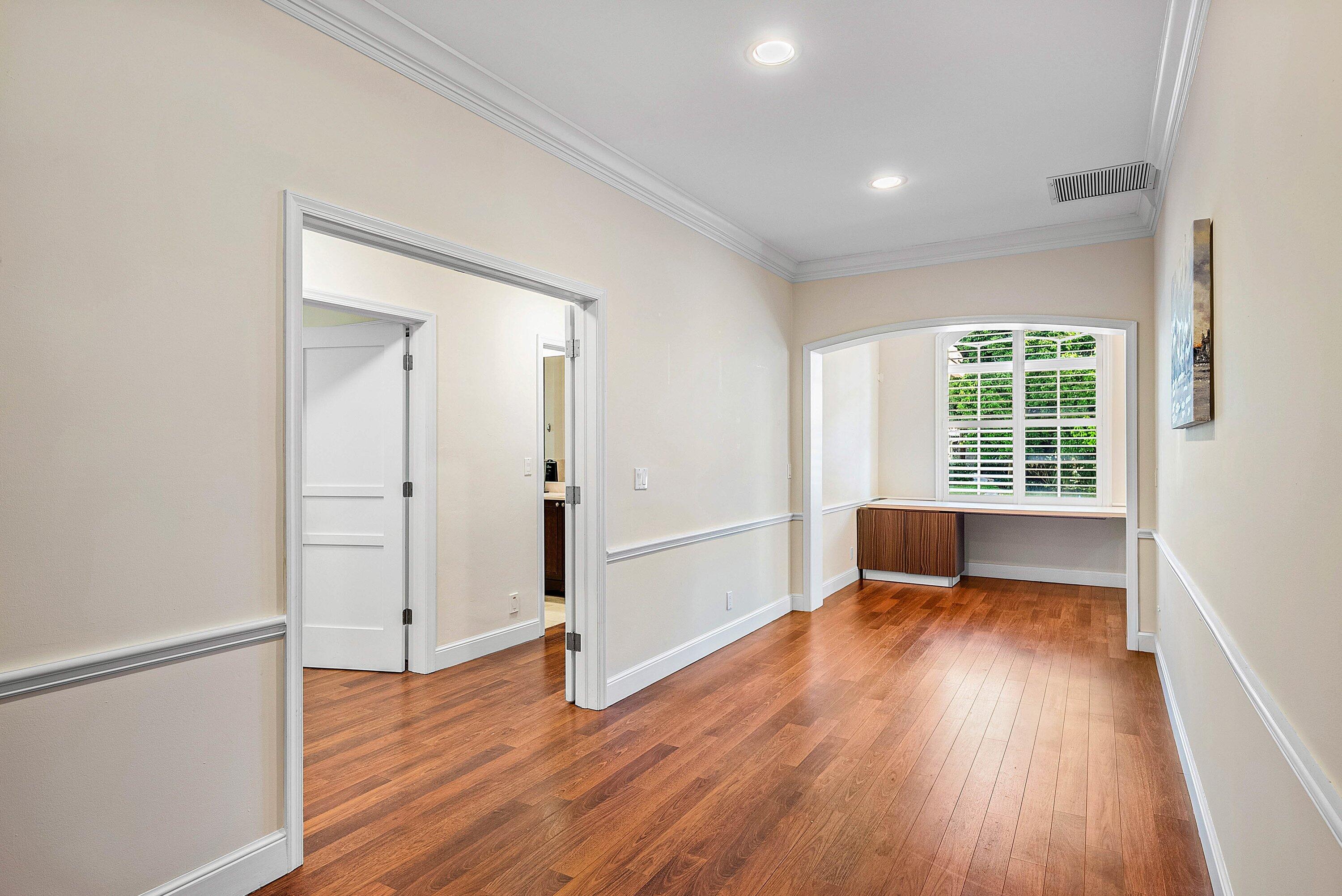2121 Areca Palm Road Boca Raton, FL 33432 - Photo 21 of 54 wooden floor in an empty room with a window