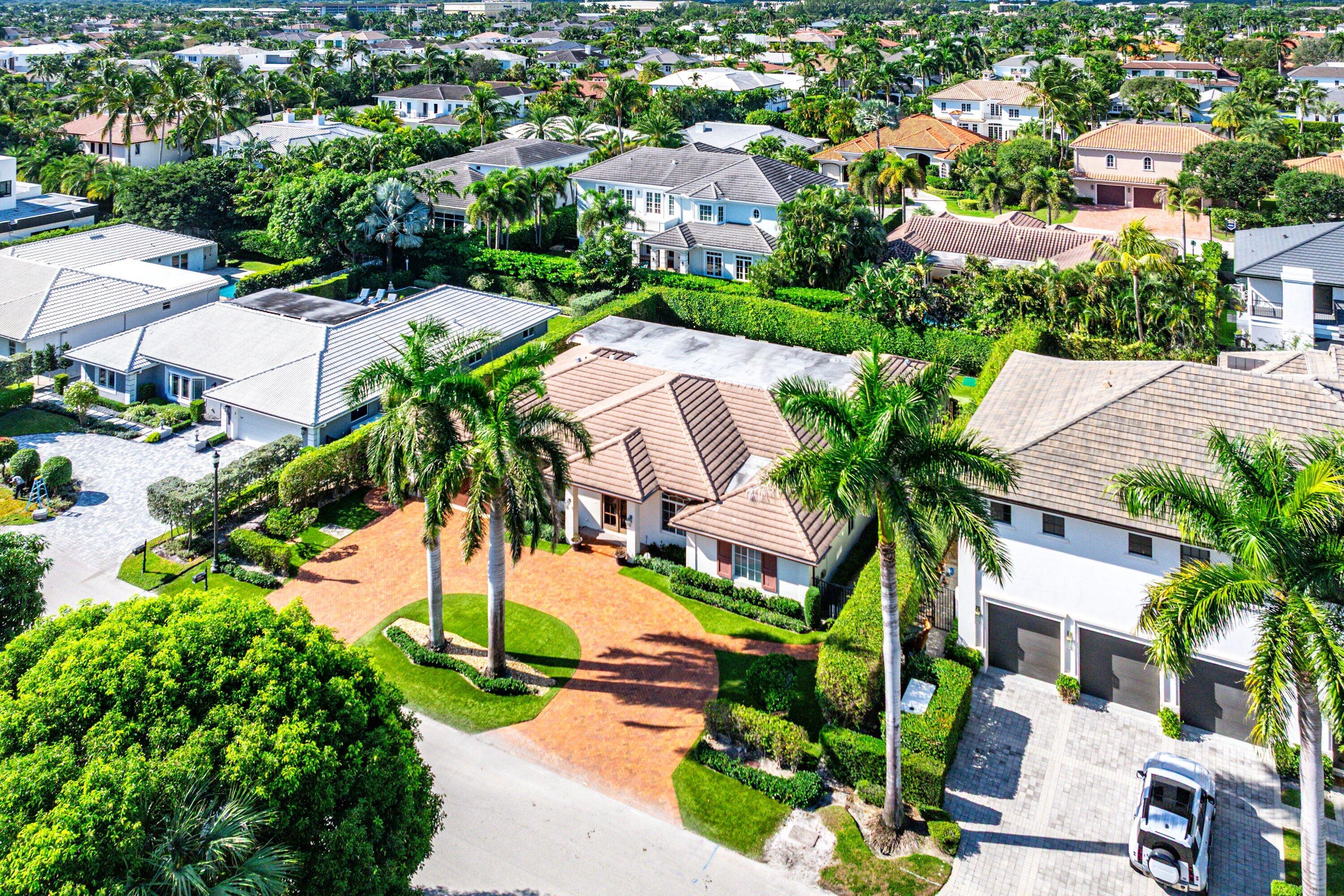 2121 Areca Palm Road Boca Raton, FL 33432 - Photo 5 of 54 an aerial view of multiple houses with yard