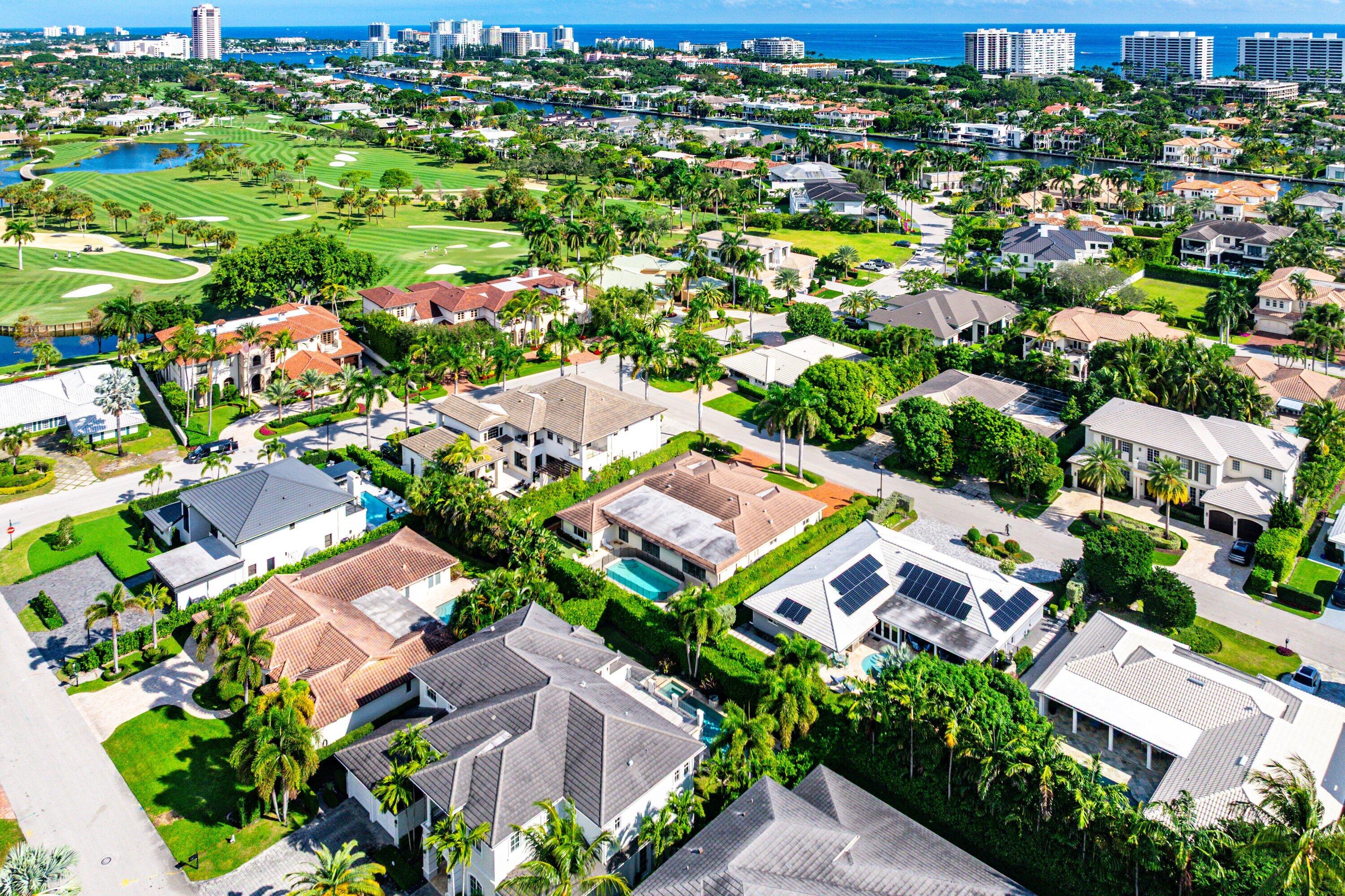 2121 Areca Palm Road Boca Raton, FL 33432 - Photo 53 of 54 an aerial view of residential houses with outdoor space and trees