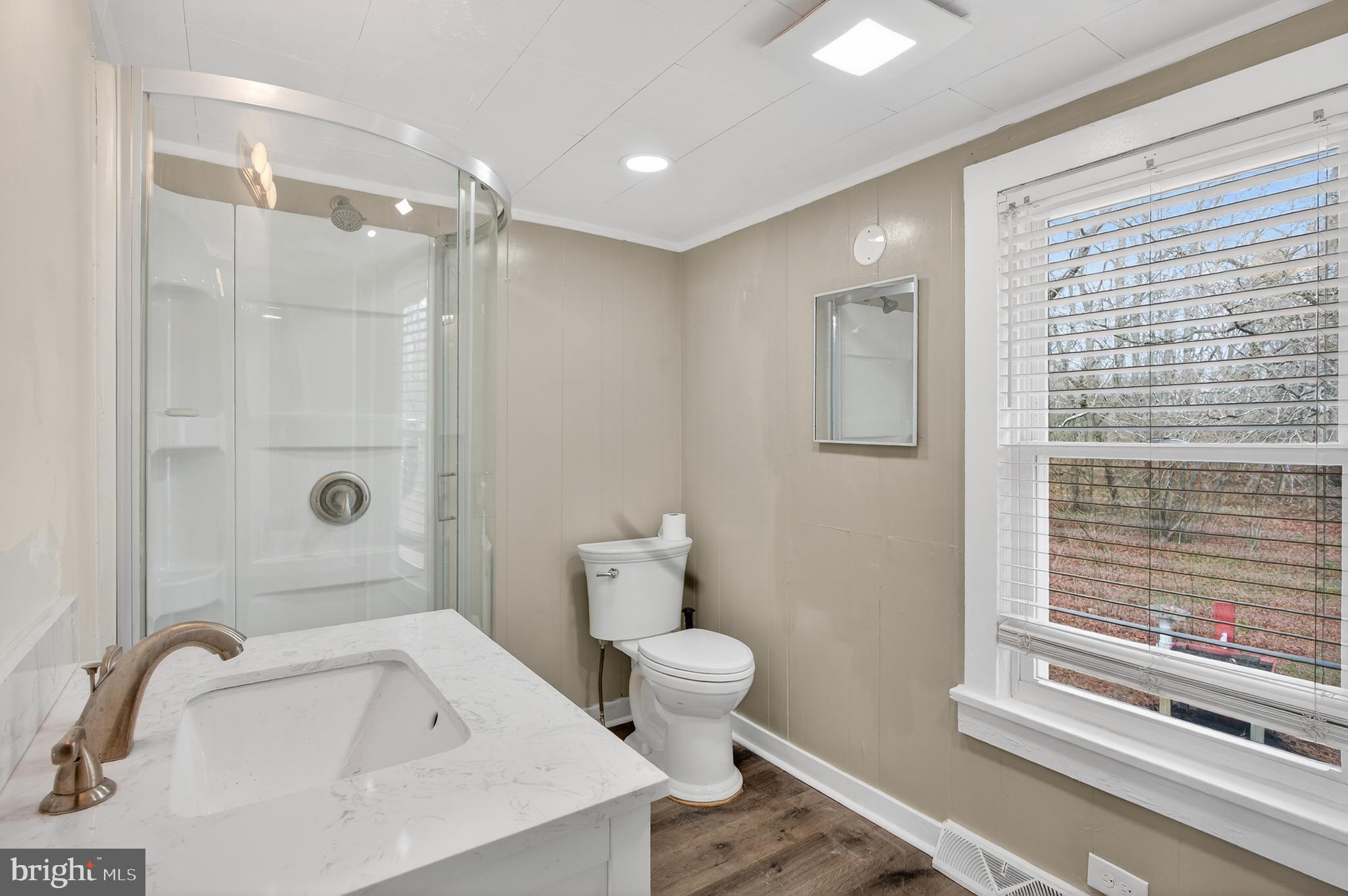171 Skeet Road Medford, NJ 08055 - Photo 12 of 17 a bathroom with a sink a toilet and shower