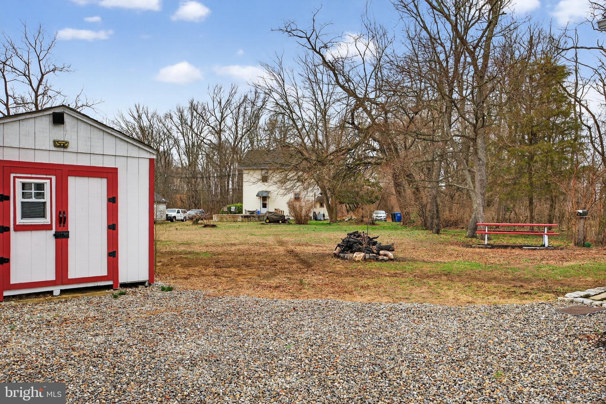 171 Skeet Road Medford, NJ 08055 - Photo 3 of 17 a view of a yard with a cars