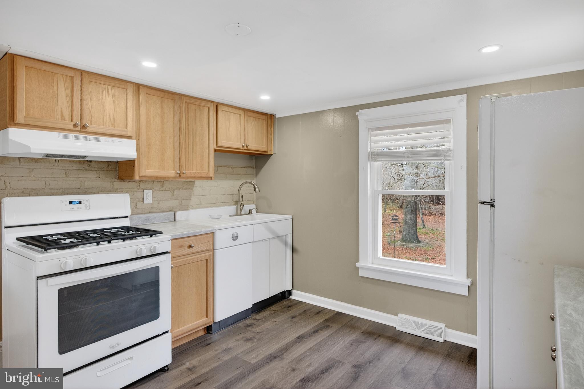171 Skeet Road Medford, NJ 08055 - Photo 8 of 17 a kitchen with a stove and a sink