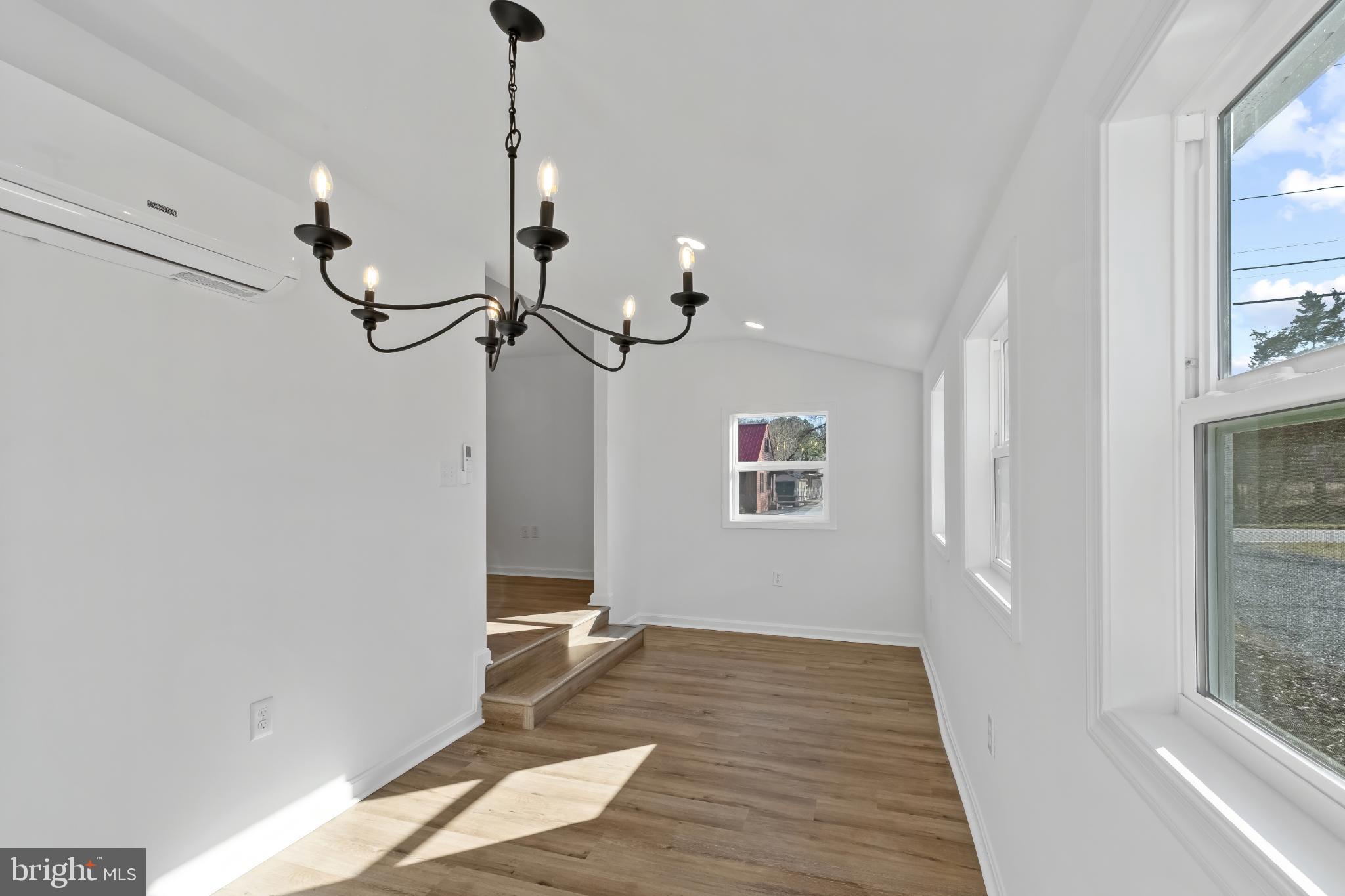 28272 Riverside Drive Salisbury, MD 21801 - Photo 22 of 30 Bright, airy space with elegant chandelier.
