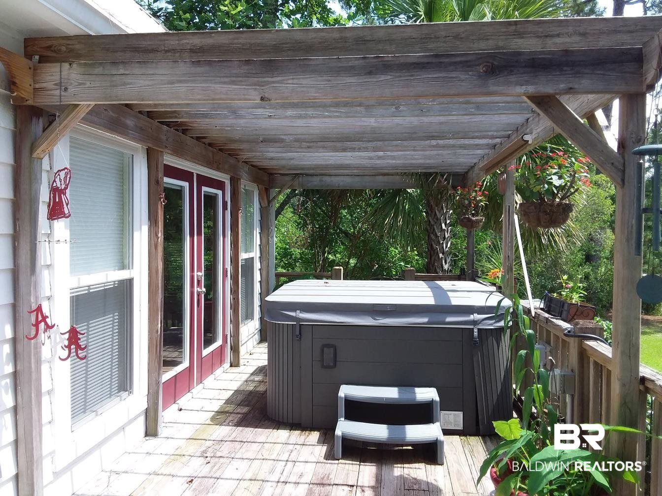 10097 Boynton Road Elberta, AL 36530 - Photo 39 of 49 Hot tub under pergola