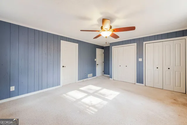 a bathroom with a sink a mirror and a shower