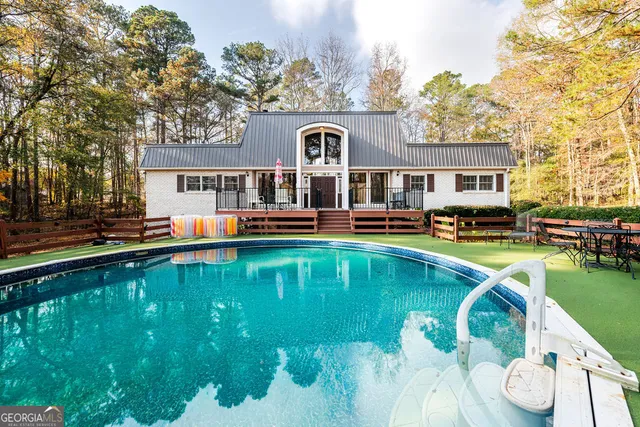 an aerial view of a house with garden space
