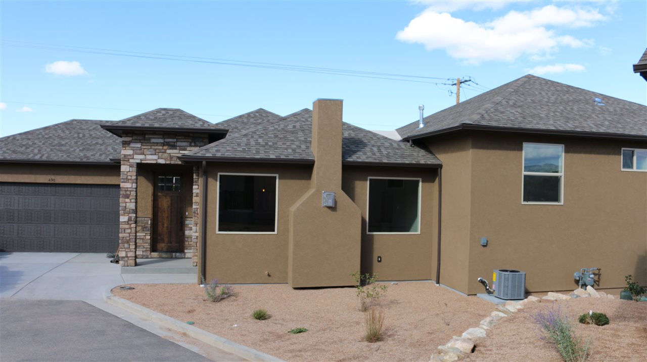 498 Tiara Rado Court Grand Junction, CO 81507 - Photo 1 of 20 a front view of a house