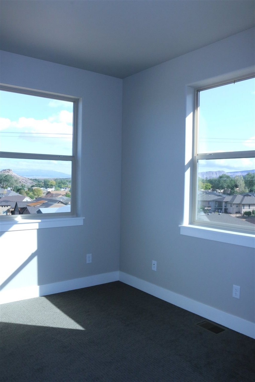 498 Tiara Rado Court Grand Junction, CO 81507 - Photo 18 of 20 an empty room with a window