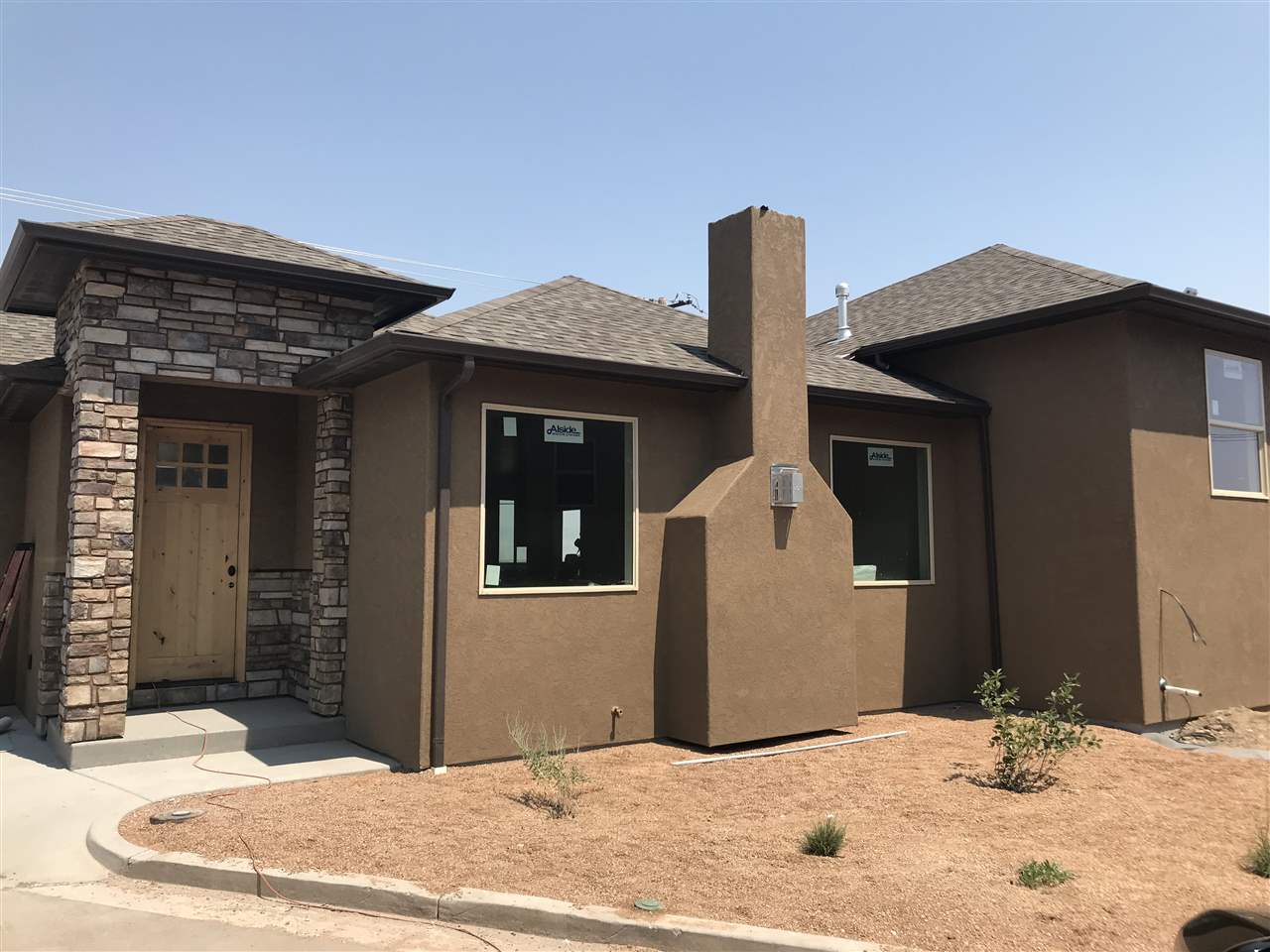 498 Tiara Rado Court Grand Junction, CO 81507 - Photo 7 of 20 a view of a house with roof