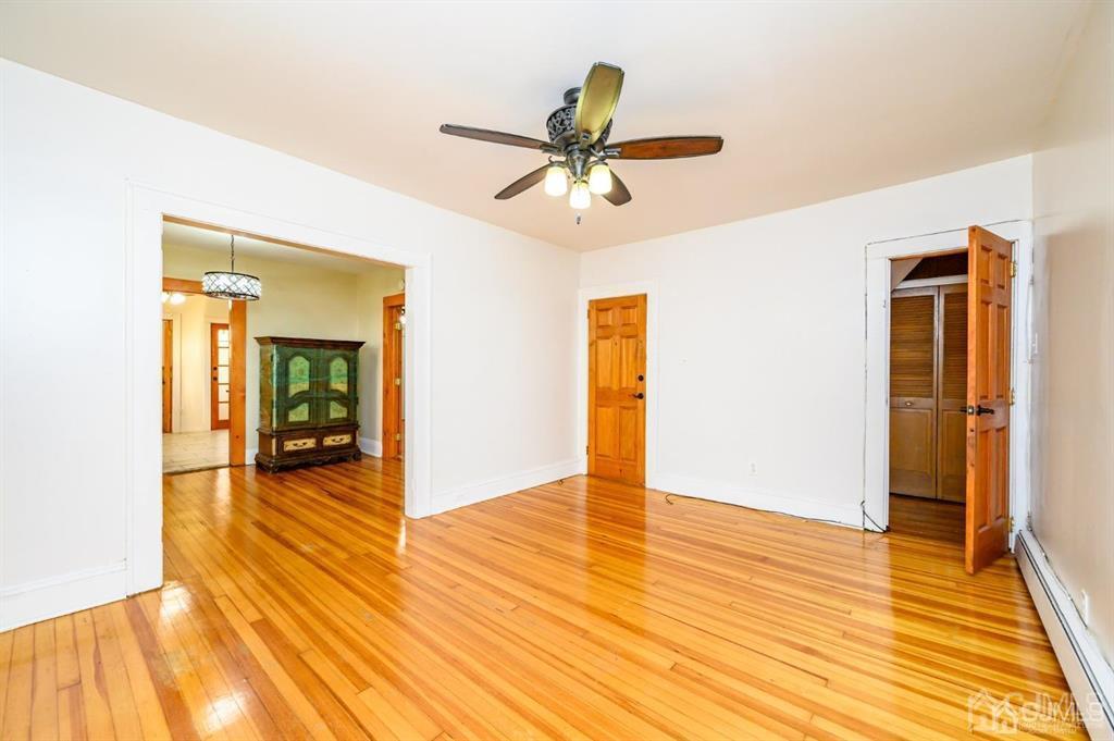 47 Marion Street Port Reading, NJ 07064 - Photo 26 of 57 a view of a livingroom with wooden floor