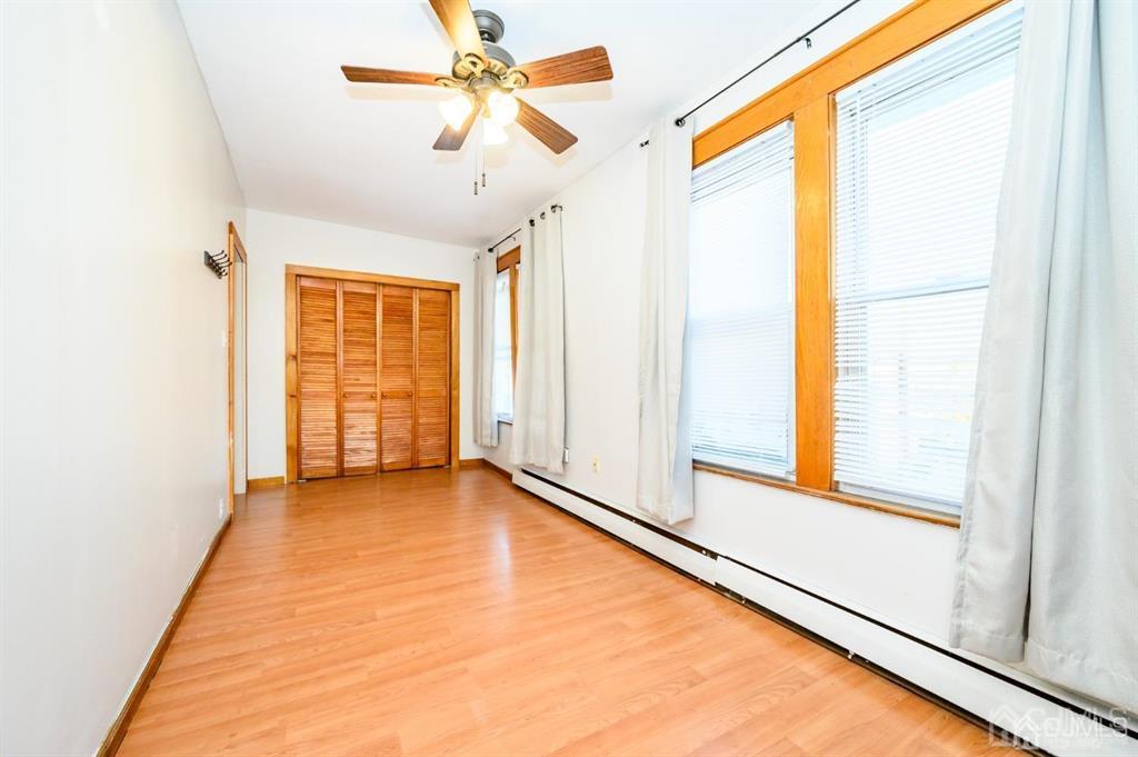 47 Marion Street Port Reading, NJ 07064 - Photo 29 of 57 a view of an empty room with a window
