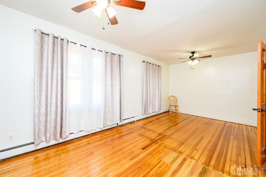 47 Marion Street Port Reading, NJ 07064 - Photo 34 of 57 a view of a room with a wooden floor