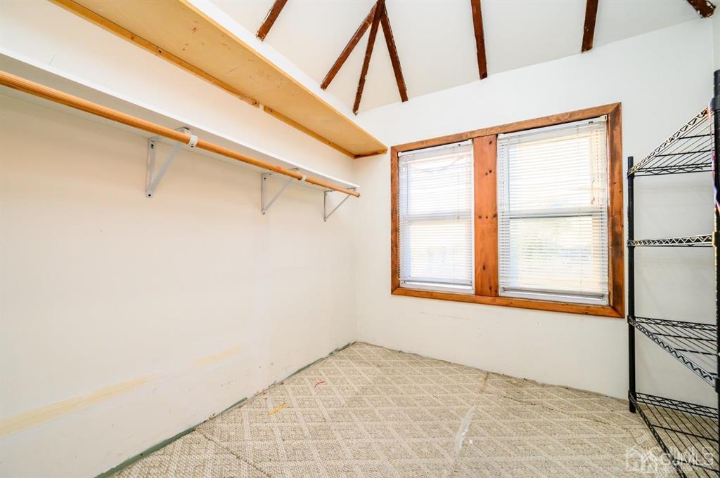 47 Marion Street Port Reading, NJ 07064 - Photo 47 of 57 a view of an empty room with a window