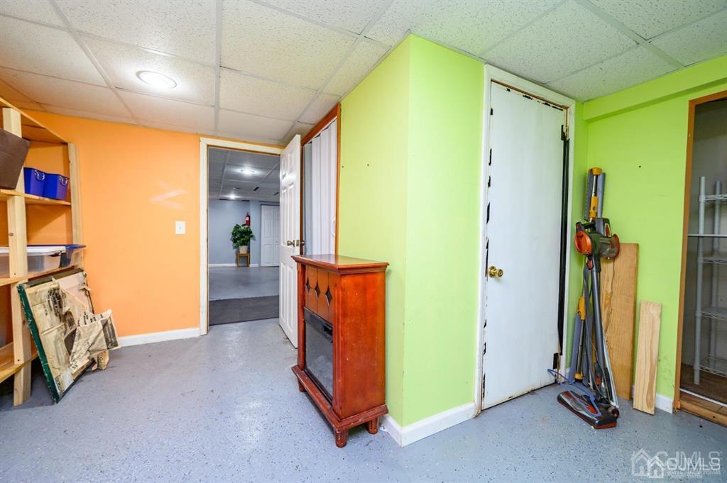 47 Marion Street Port Reading, NJ 07064 - Photo 51 of 57 a view of hallway with furniture and a window