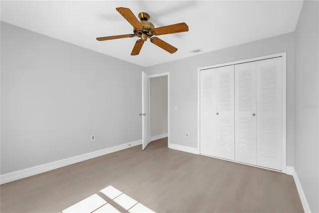 a view of a ceiling fan in a room