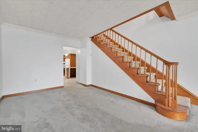 a view of an entryway with staircase
