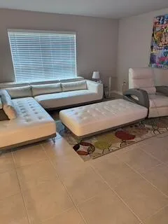 a bedroom with bed and a window