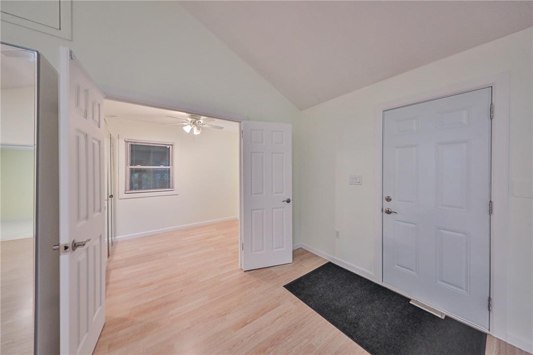 5599 Minks Pond Road Bushkill, PA 18324 - Photo 25 of 64 A welcoming entry area boasts light wood flooring and convenient access to an adjacent room.