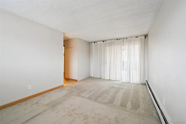 an empty room with a natural light