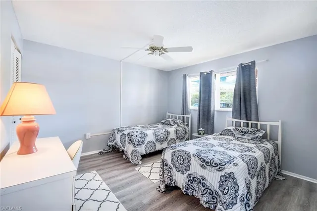 a bathroom with a shower sink and mirror