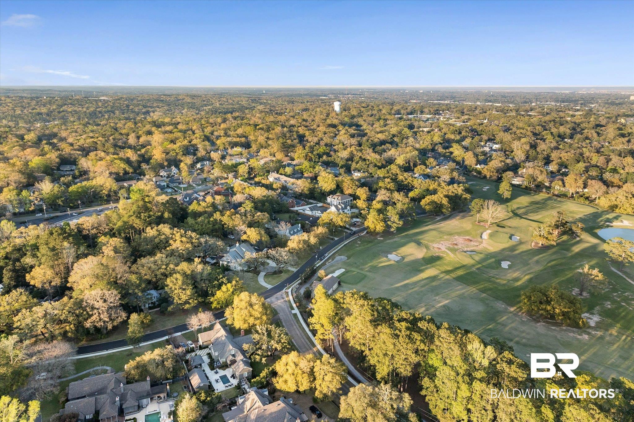 2 Westgate Road Mobile, AL 36608 - Photo 55 of 63 Aerial perspective of suburban area featuring a golf club and a forest