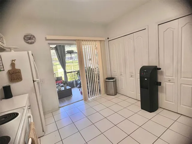 a living room with a couch and a table in it