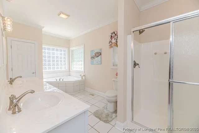 a view of a livingroom with lounge chair and a window