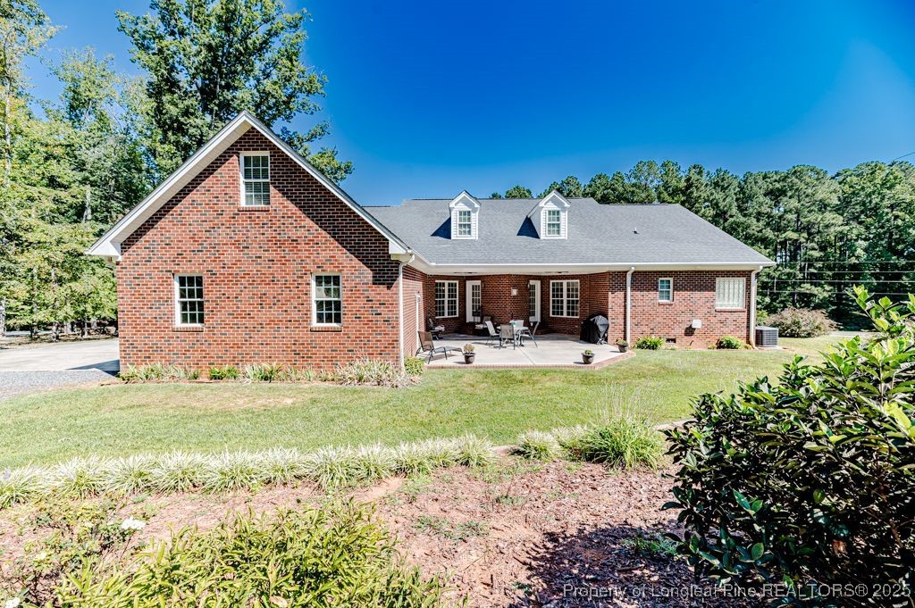 4635 Farrell Road Sanford, NC 27330 - Photo 26 of 30 a front view of a house with a yard