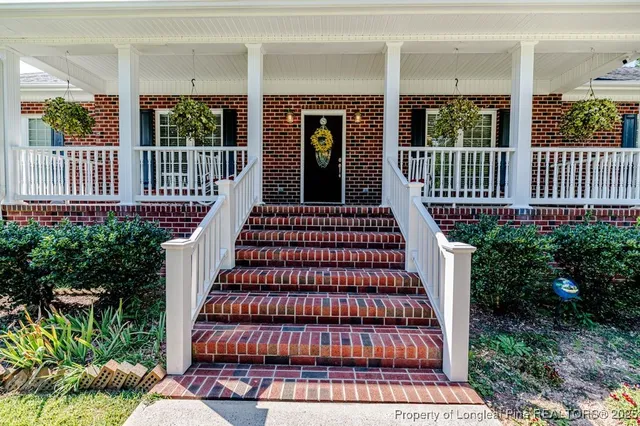 a view of a house with a porch
