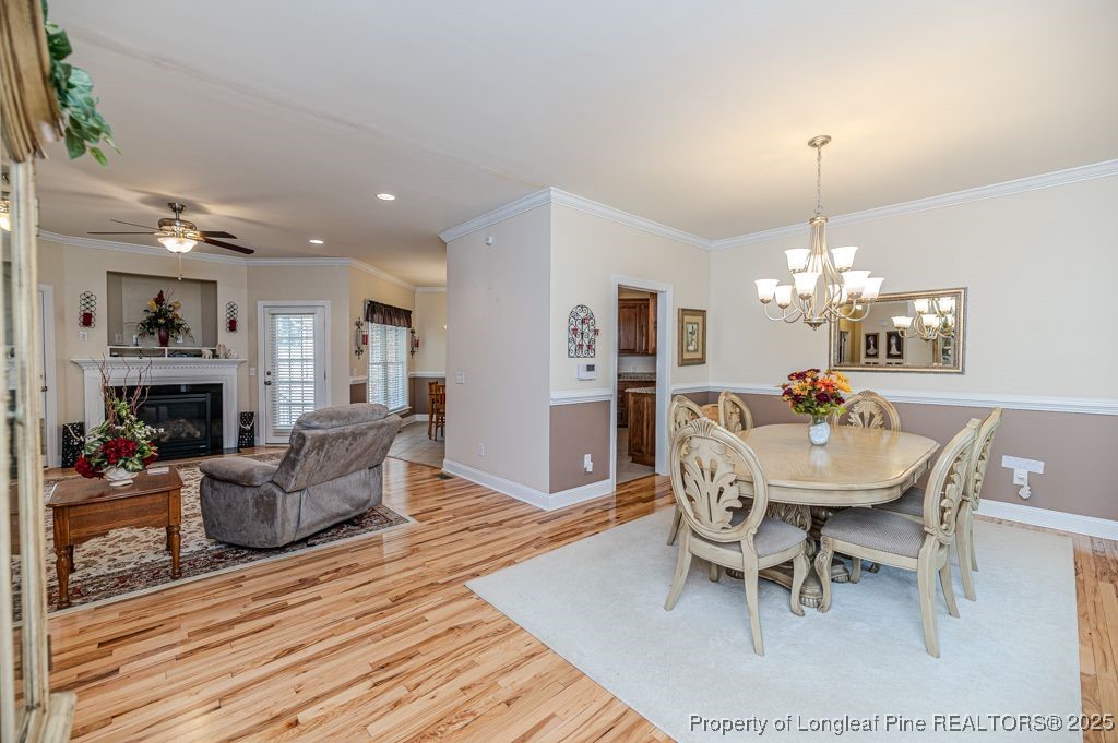 4635 Farrell Road Sanford, NC 27330 - Photo 5 of 30 a view of a dining room with furniture wooden floor and chandelier