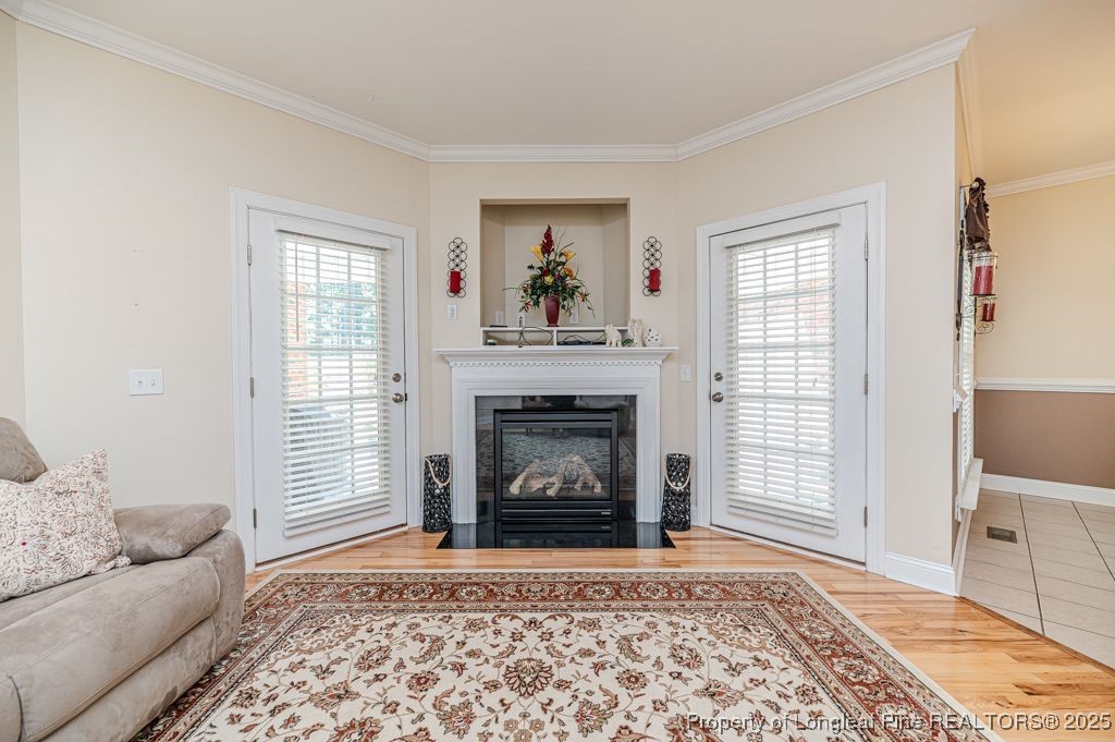 4635 Farrell Road Sanford, NC 27330 - Photo 7 of 30 a living room with furniture and a fireplace