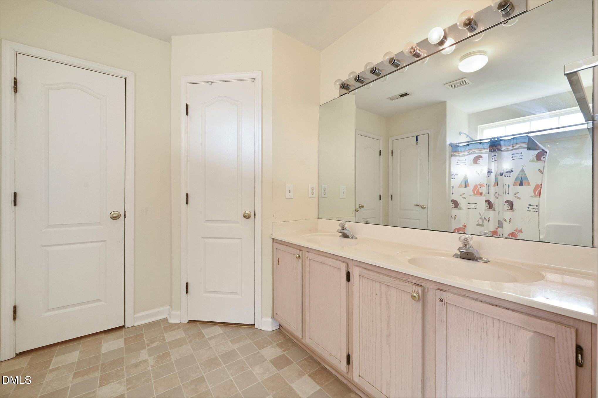 5115 Cardinal Grove Boulevard Raleigh, NC 27616 - Photo 12 of 36 Master Bath