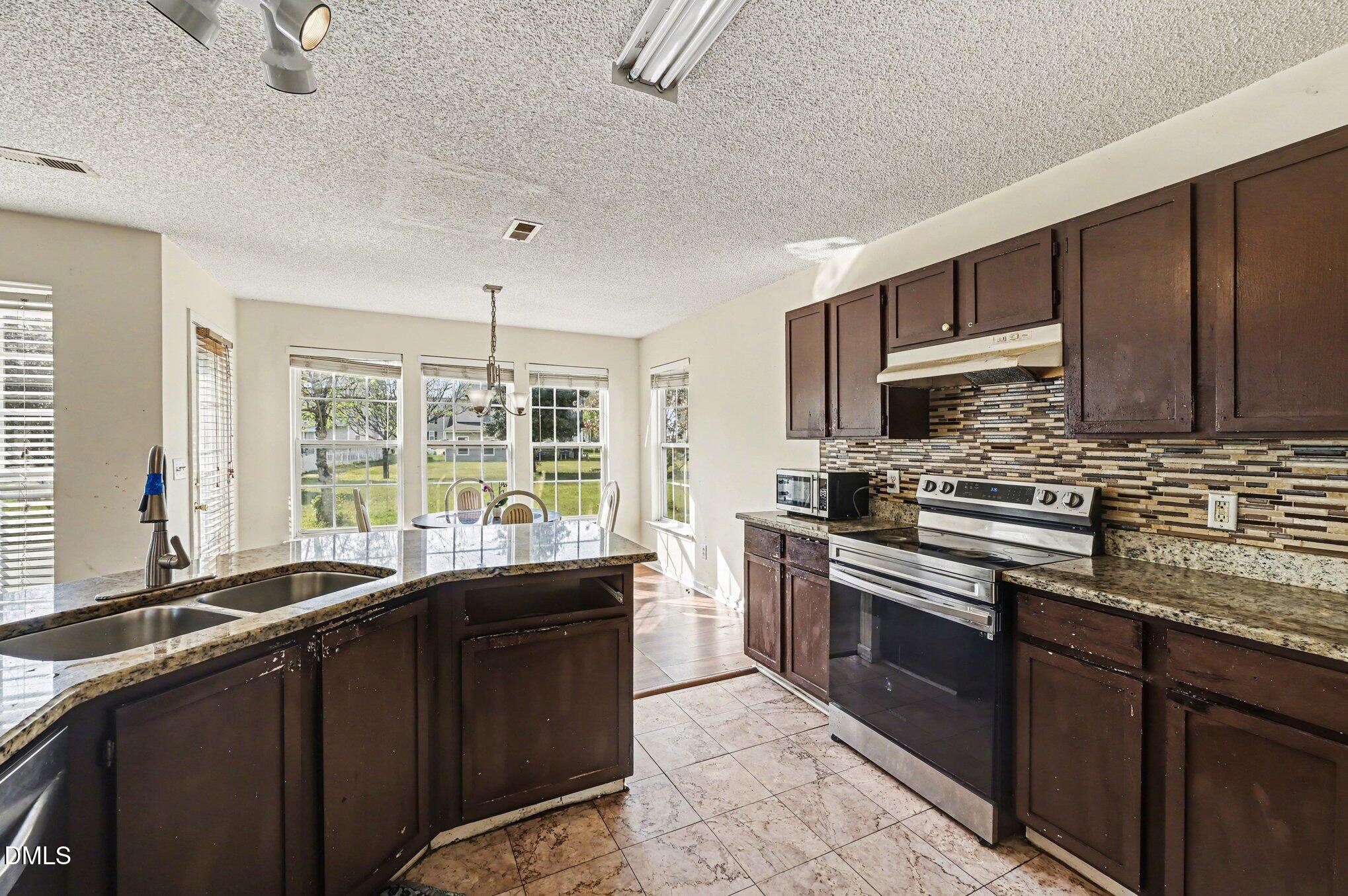 5115 Cardinal Grove Boulevard Raleigh, NC 27616 - Photo 3 of 36 Kitchen