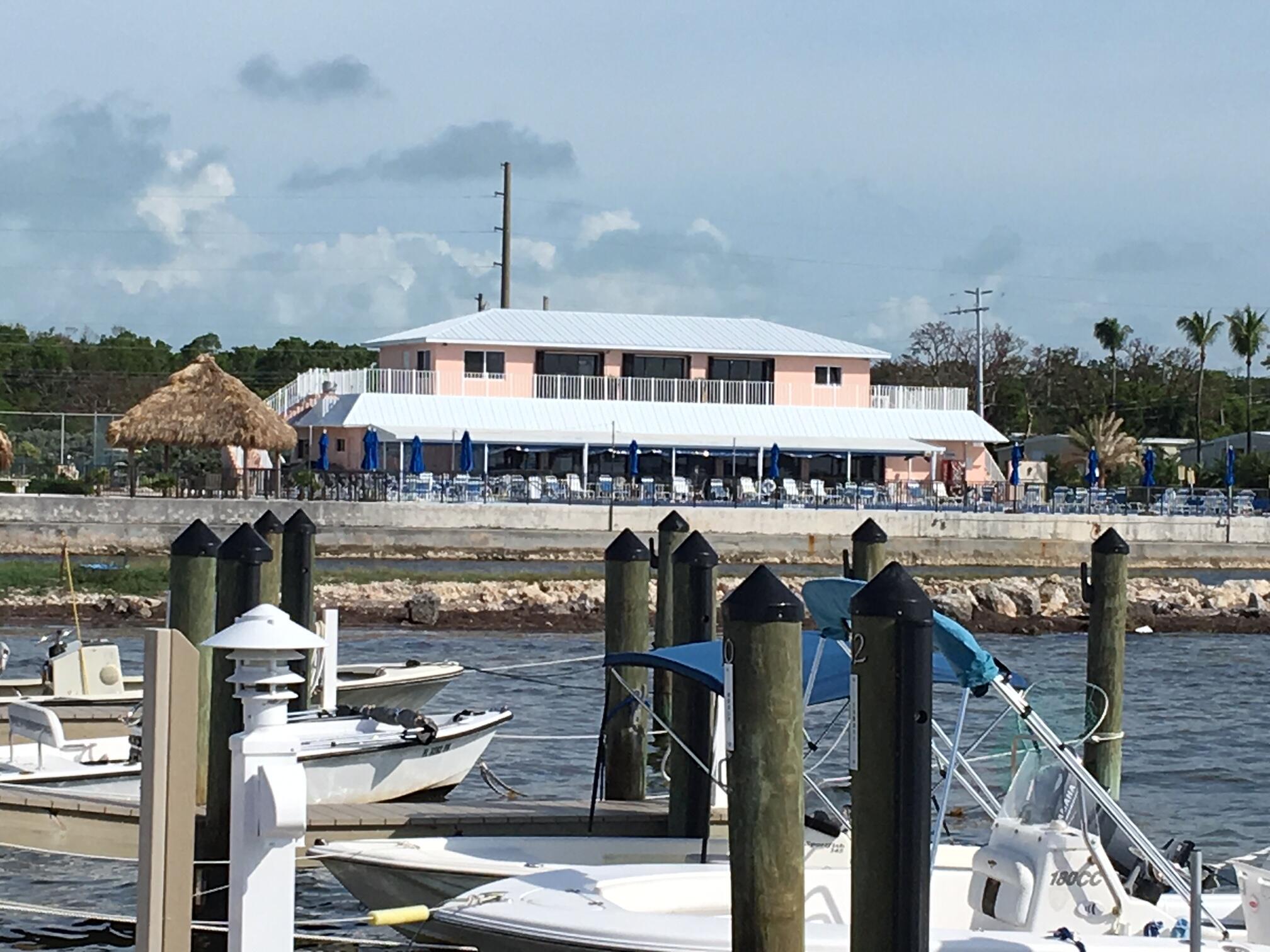 505 North Ruby Avenue Key Largo, FL 33037 - Photo 41 of 52 CLUB HOUSE VIEW FROM DOCK