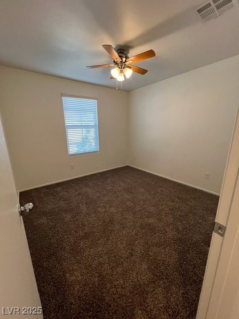 4561 Woolcomber Street Las Vegas, NV 89115 - Photo 7 of 19 Carpeted empty room with baseboards and ceiling fan