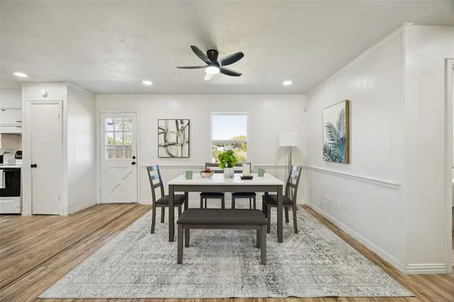 a view of a dining room with furniture