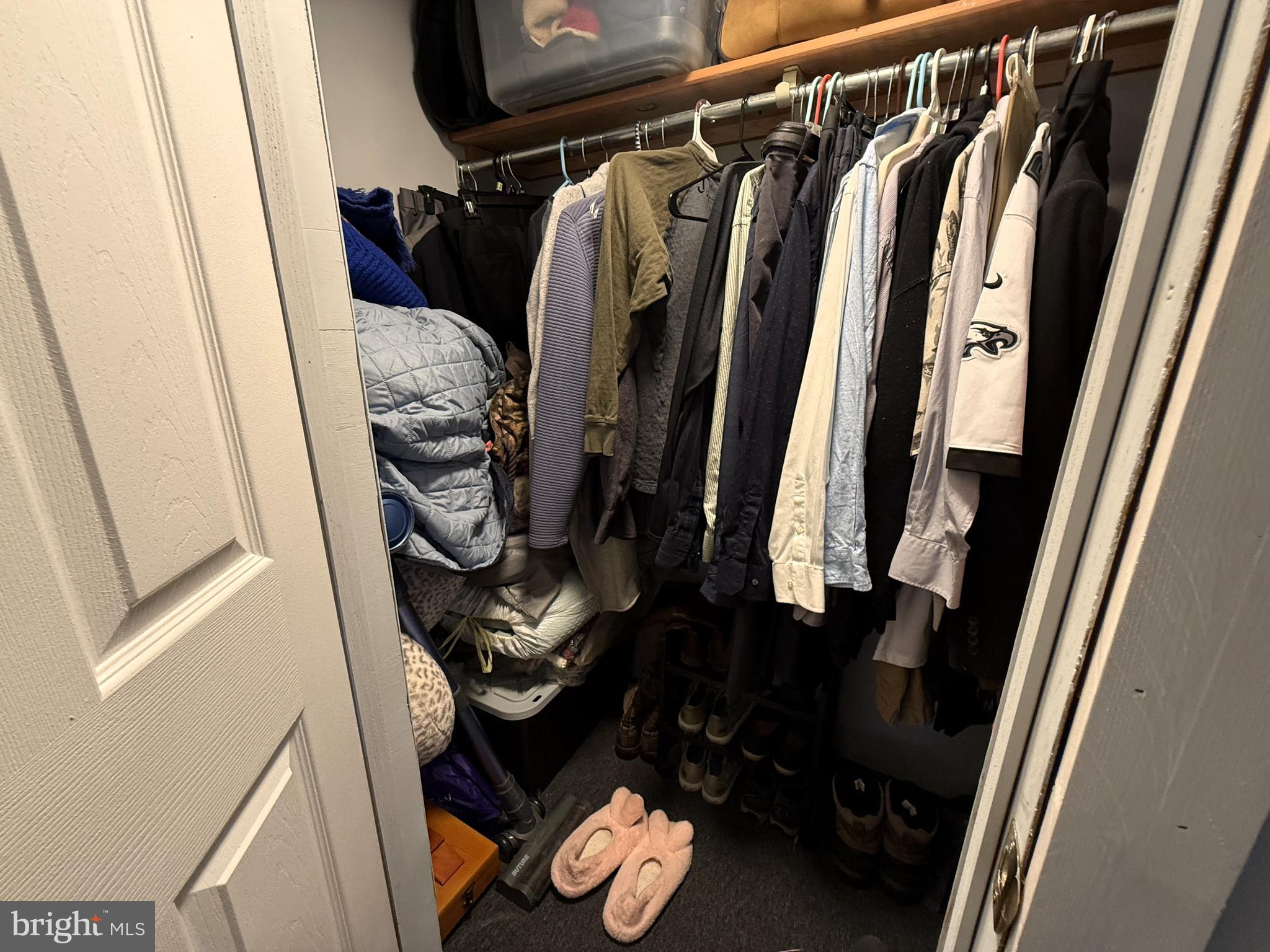 260 Marshall Mill Road, Unit 146 Malaga, NJ 08328 - Photo 26 of 34 a view of walk in closet with clothes and shoes