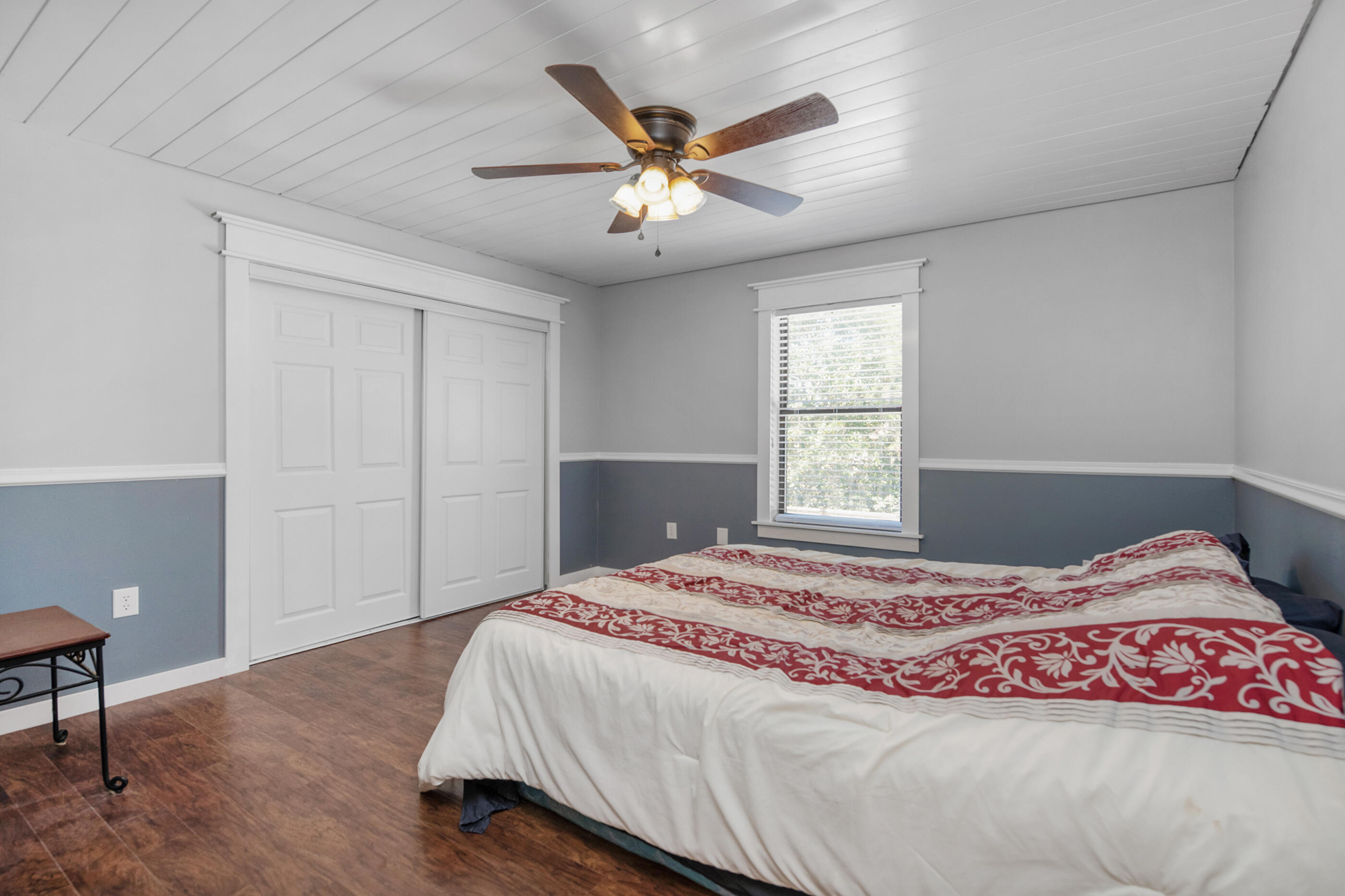 6539 Robar Tesora Street Navarre, FL 32566 - Photo 28 of 48 a bedroom with a bed and window