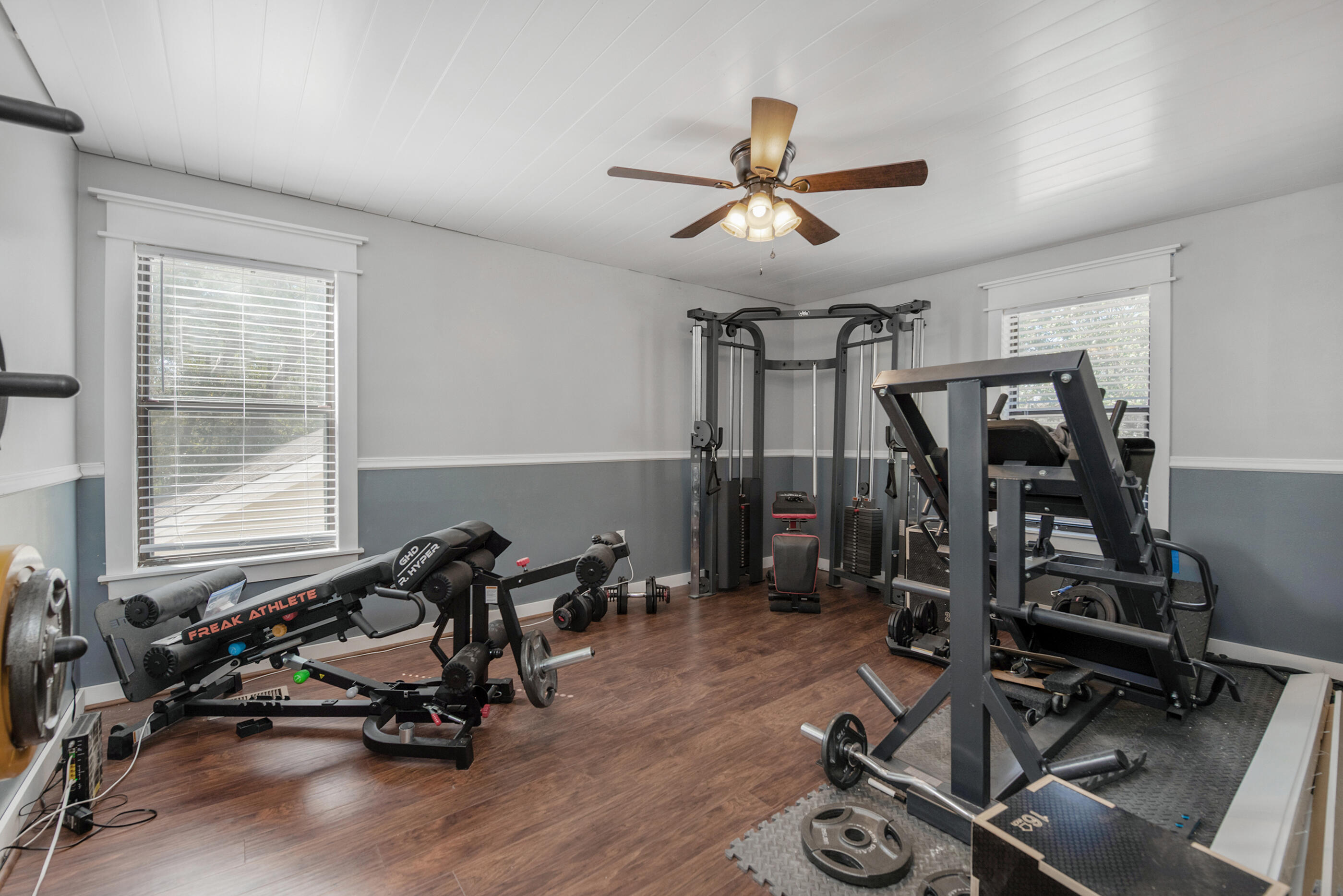 6539 Robar Tesora Street Navarre, FL 32566 - Photo 29 of 48 a view of a room with gym equipment